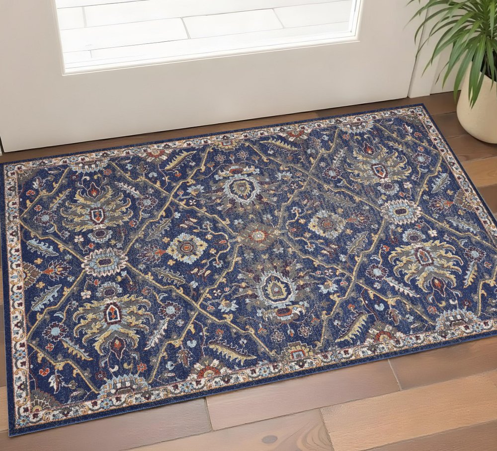 5' X 8' Royal Blue Gold And Gray Medallion Area Rug
