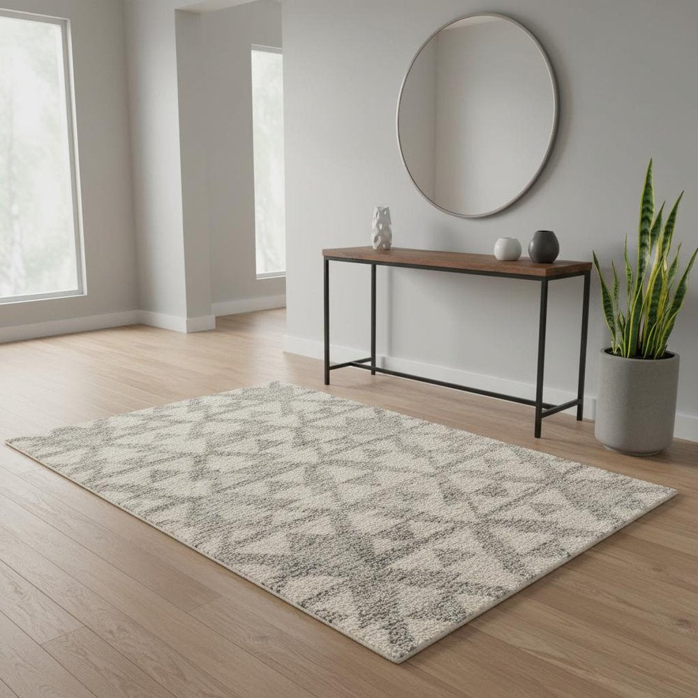 4' X 6' Ivory And Gray Geometric Distressed Area Rug