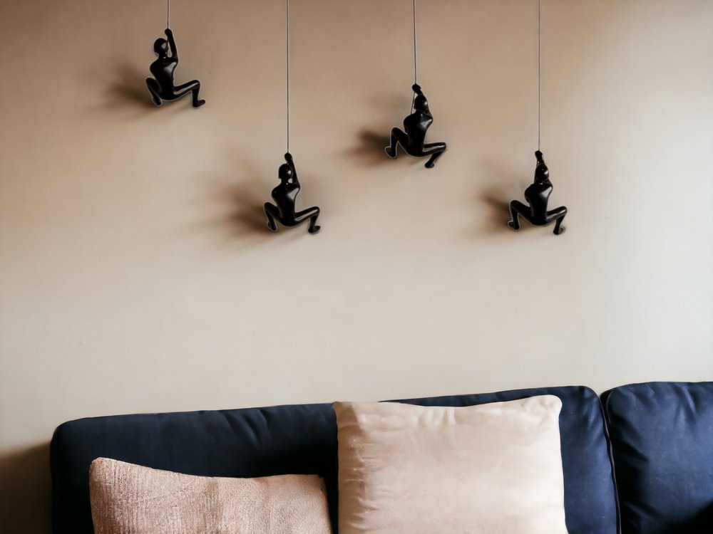 Set of Four Black Resin Climbing Man Hanging Dimensional Sculpture