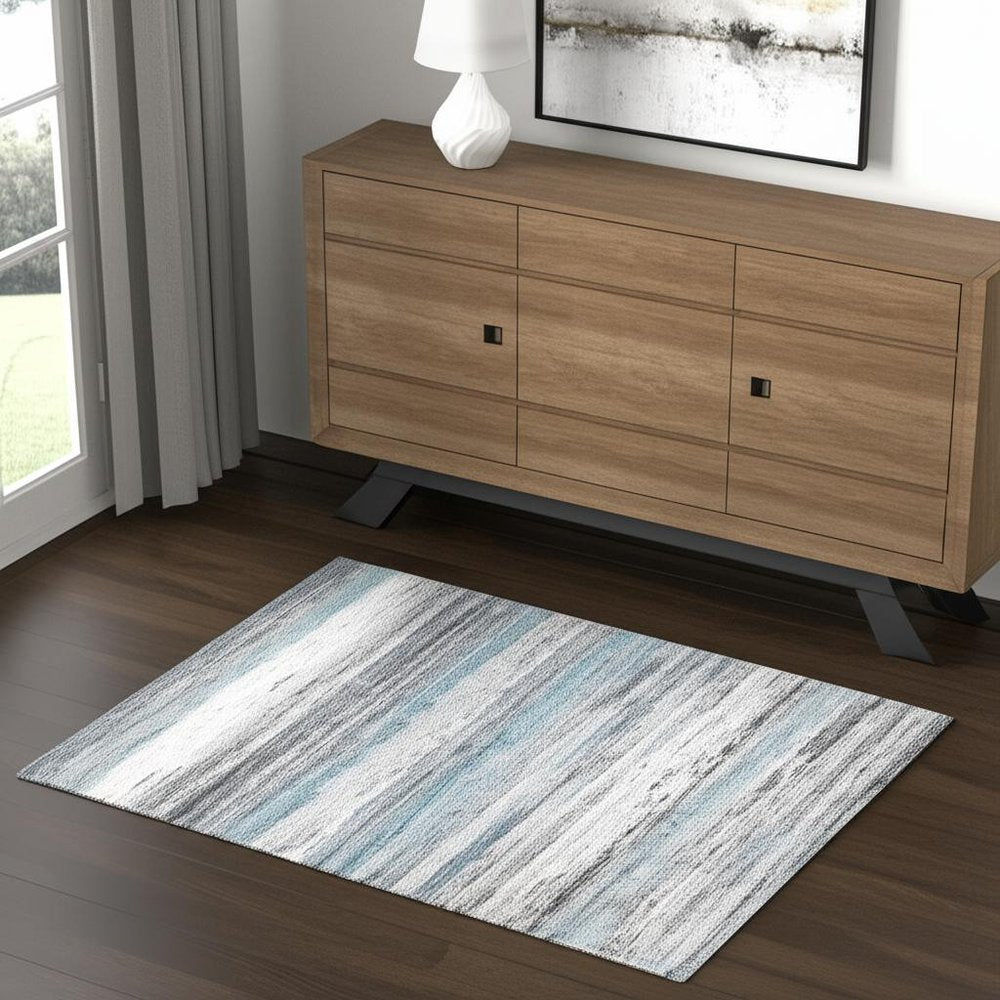 4' X 6' Turquoise and Gray Abstract Stain Resistant Area Rug