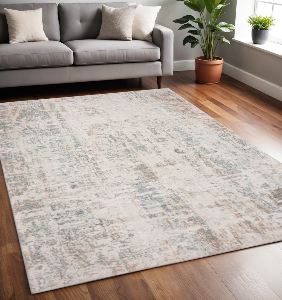 5' X 7' Gray Blue Taupe And Cream Abstract Distressed Stain Resistant Area Rug