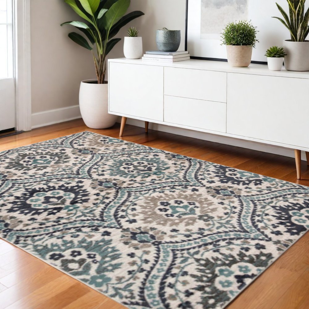 4' X 6' Ivory Blue And Gray Medallion Area Rug