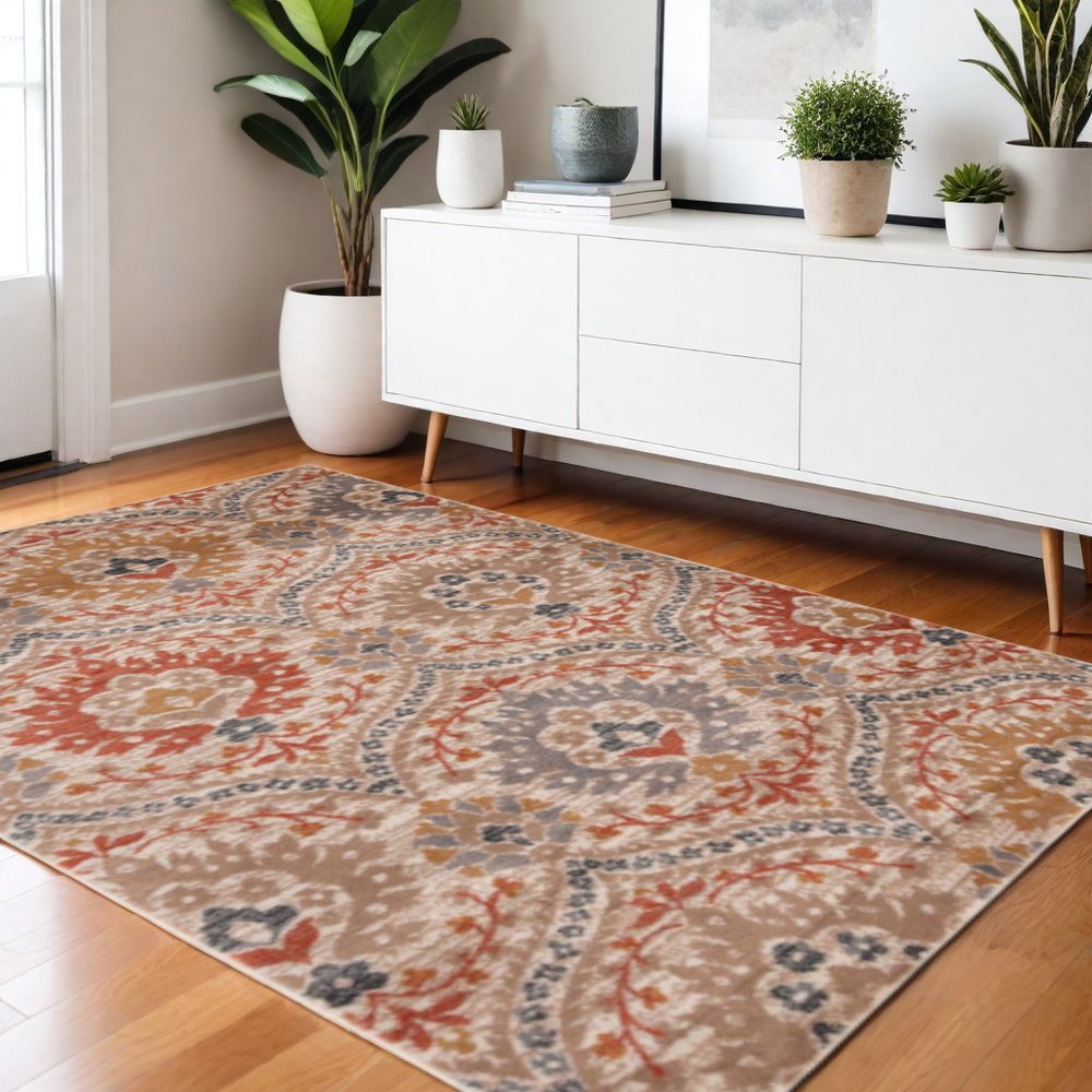 4' X 6' Orange And Ivory Floral Area Rug