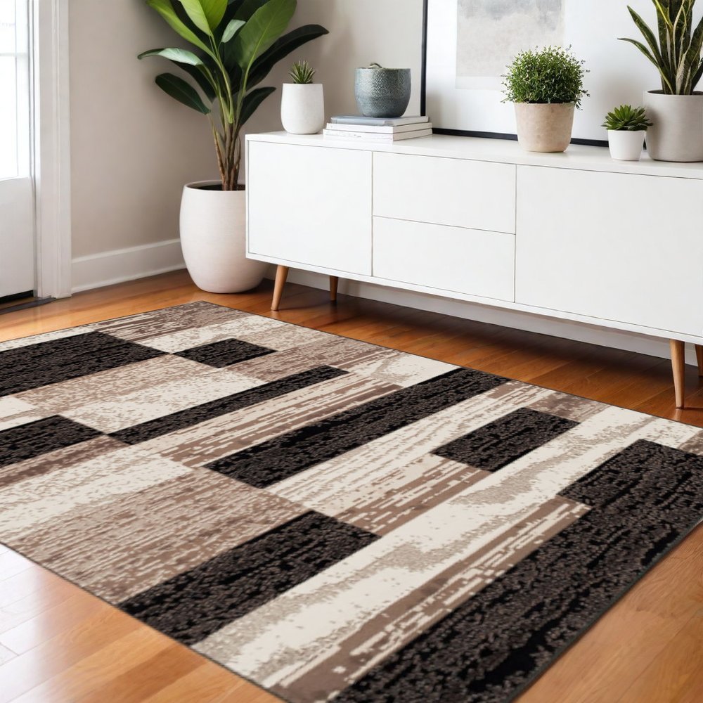 4' X 6' Black Brown And Beige Patchwork Area Rug