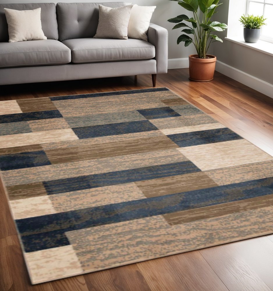 5' X 8' Blue Brown And Beige Patchwork Area Rug