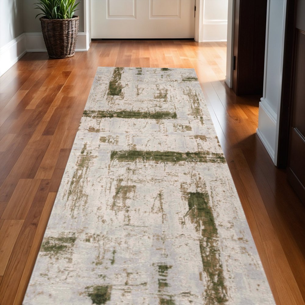 13' Green and Ivory Abstract Power Loom Distressed Runner Rug