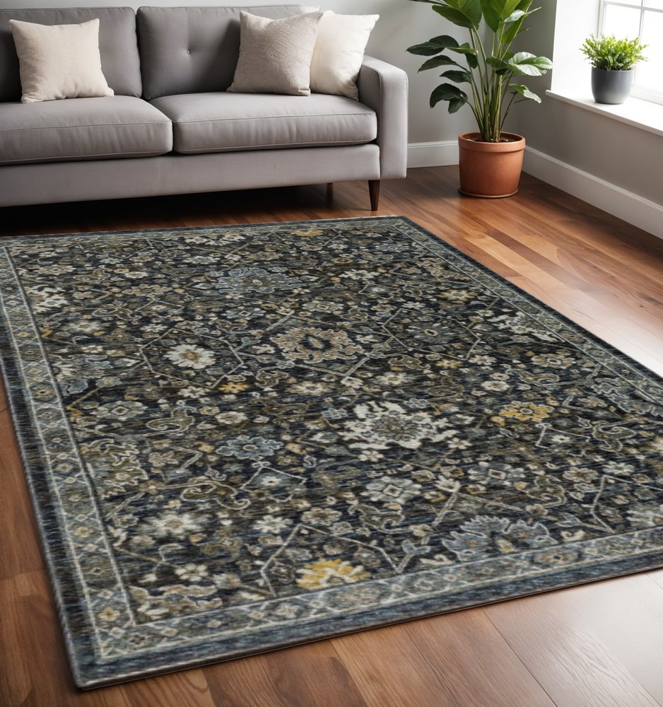 5' X 8' Blue Ivory Grey Gold Green And Brown Oriental Power Loom Stain Resistant Area Rug With Fringe