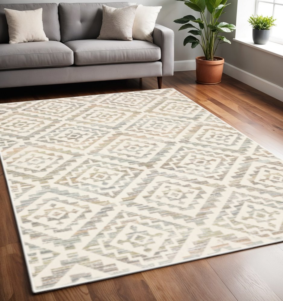 4' X 6' Grey Pink And Sage Geometric Power Loom Stain Resistant Area Rug