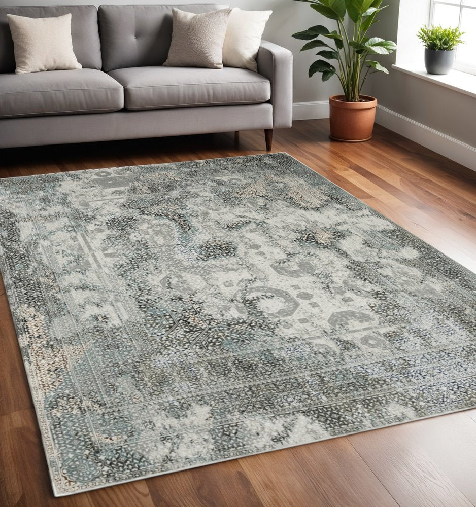 2' X 8' Ivory Grey Charcoal Blue And Rust Oriental Power Loom Stain Resistant Runner Rug