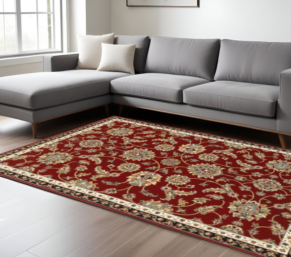 2' X 4' Red Black Blue Ivory Green And Salmon Oriental Power Loom Stain Resistant Area Rug