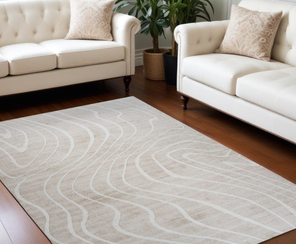 7' X 10' Beige and Ivory Abstract Distressed Area Rug