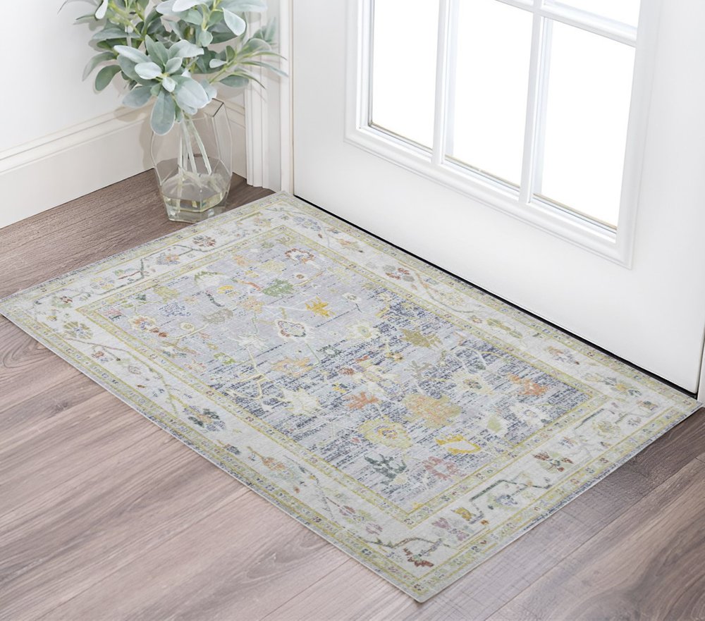2' X 3' Ivory Blue And Green Floral Distressed Area Rug