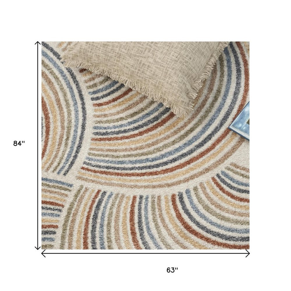 5' X 7' Blue and Ivory Abstract Power Loom Washable Area Rug