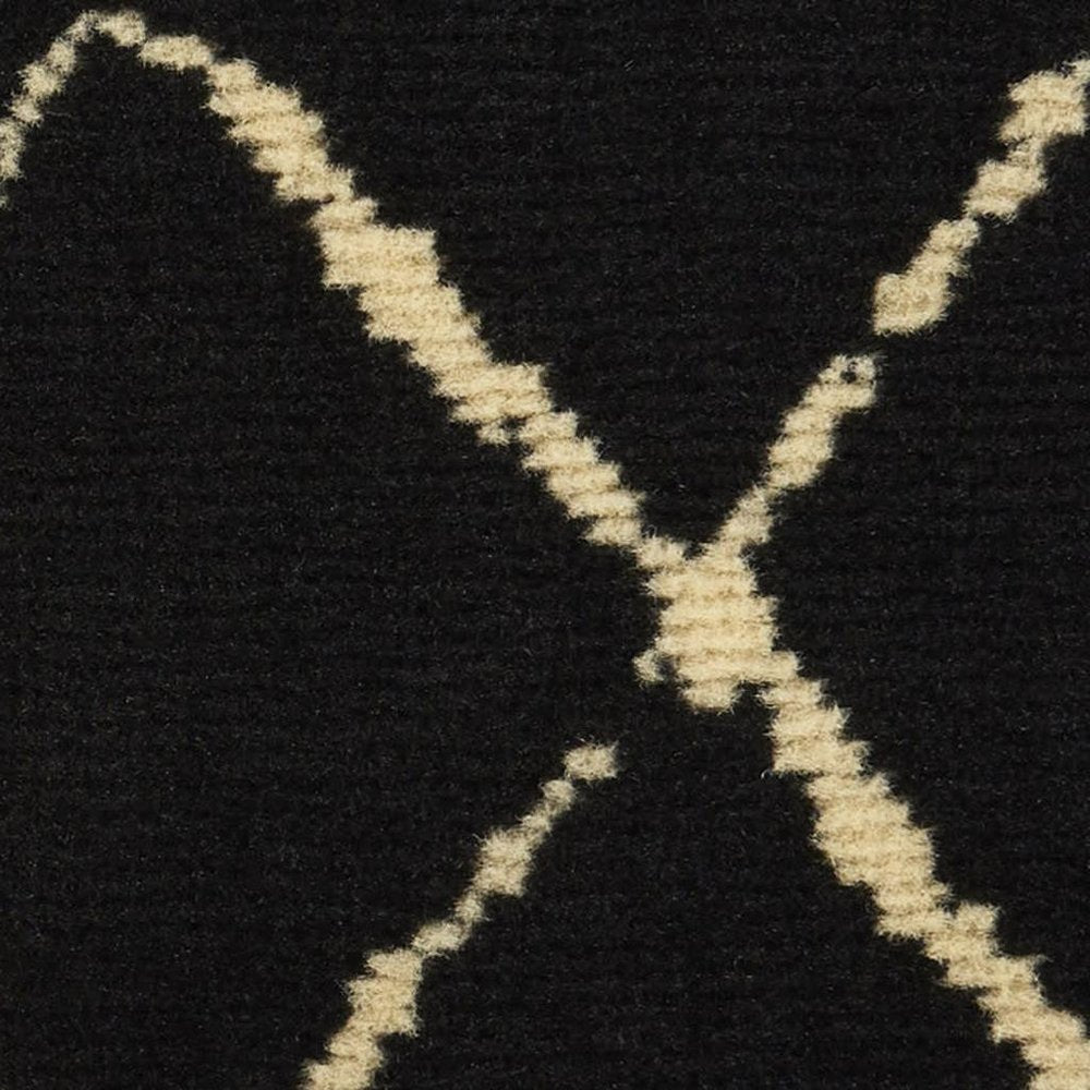 6' X 9' Black and Ivory Abstract Power Loom Distressed Area Rug