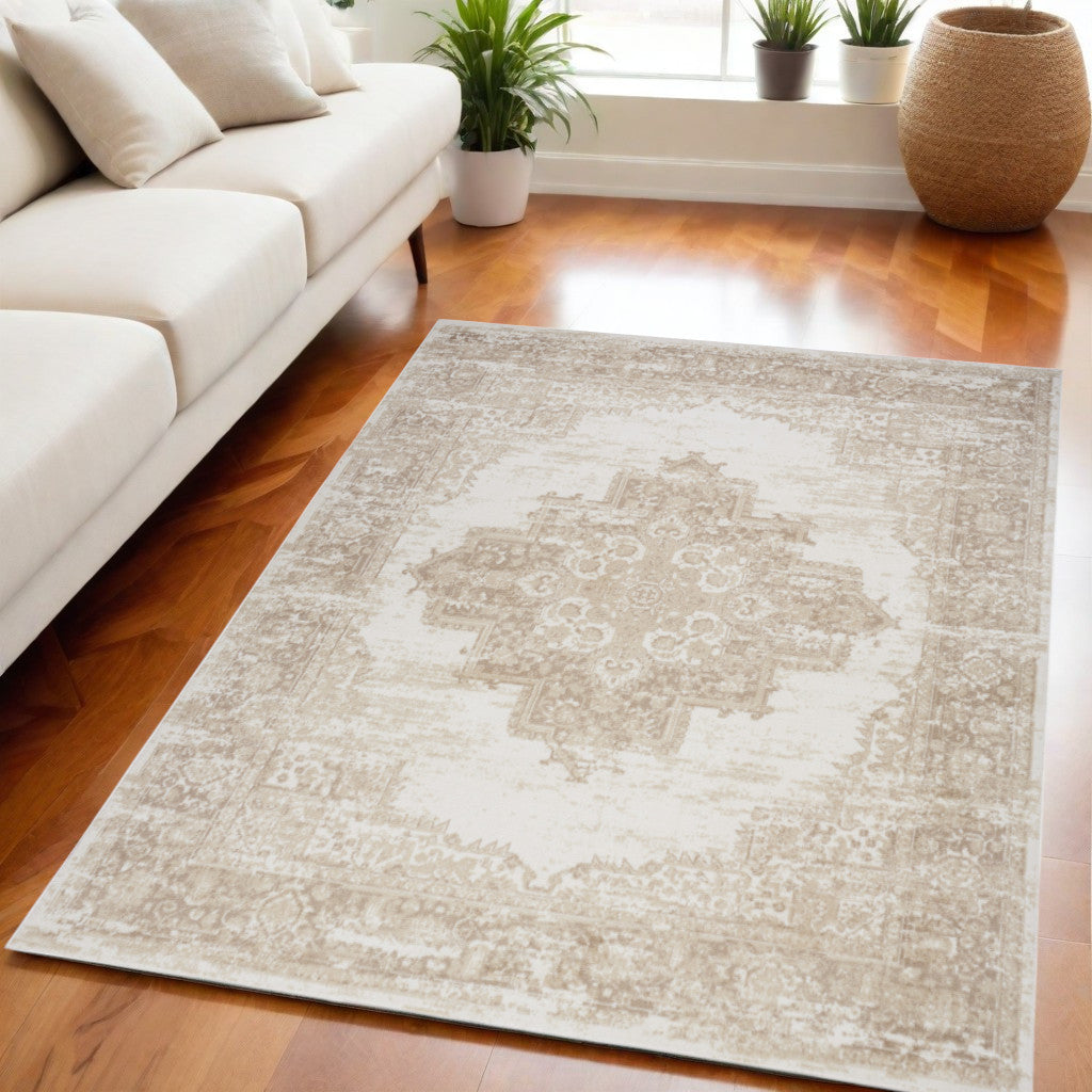 5' X 7' Beige and Ivory Medallion Power Loom Distressed Area Rug