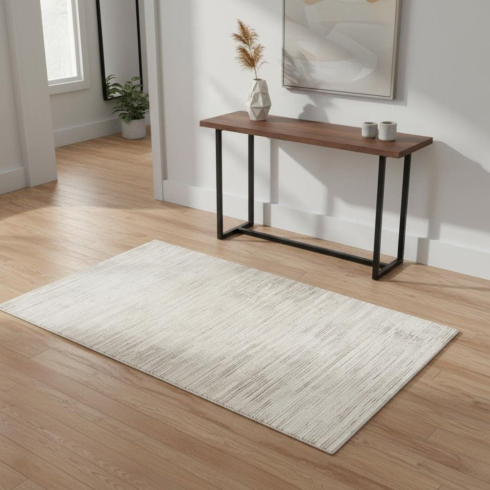 4' X 6' Cream and Beige Abstract Area Rug