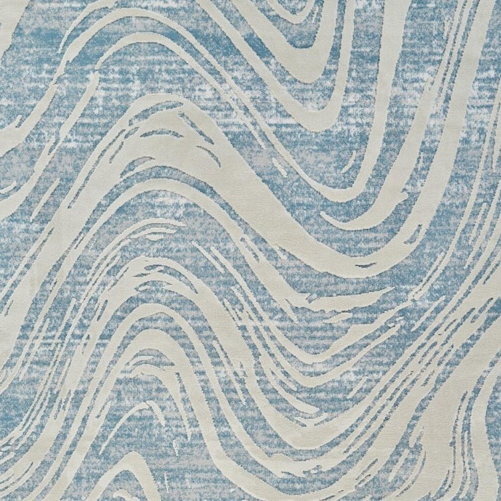 4' X 6' Blue and Beige Abstract Distressed Area Rug
