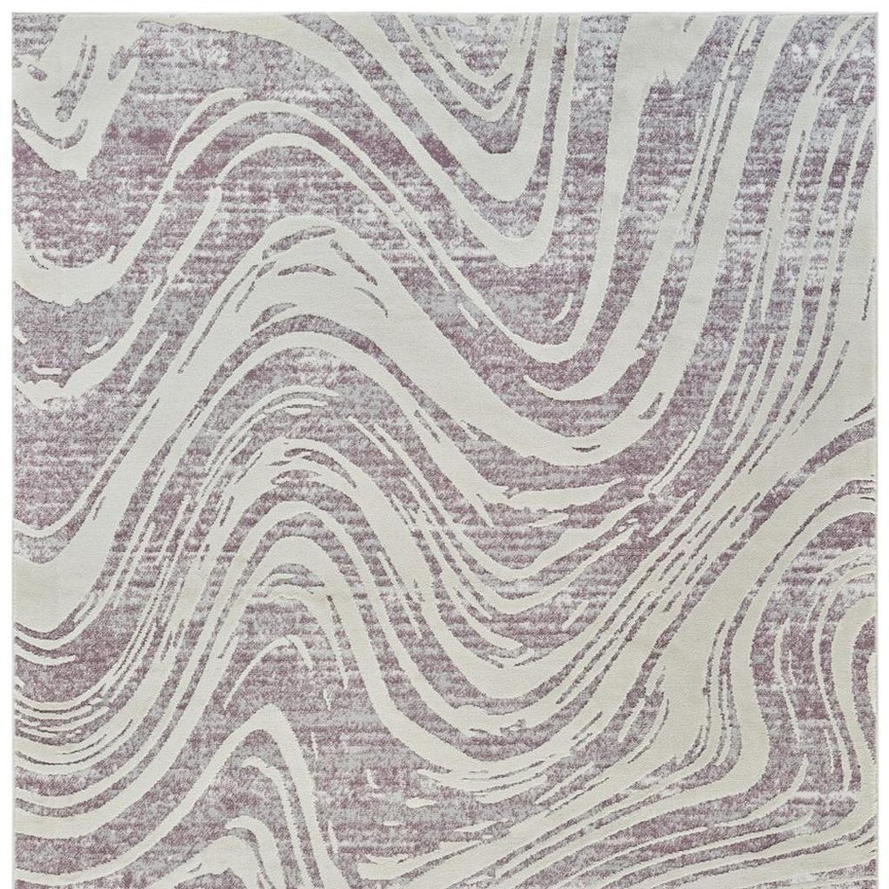 5' X 8' Beige and Purple Abstract Distressed Area Rug