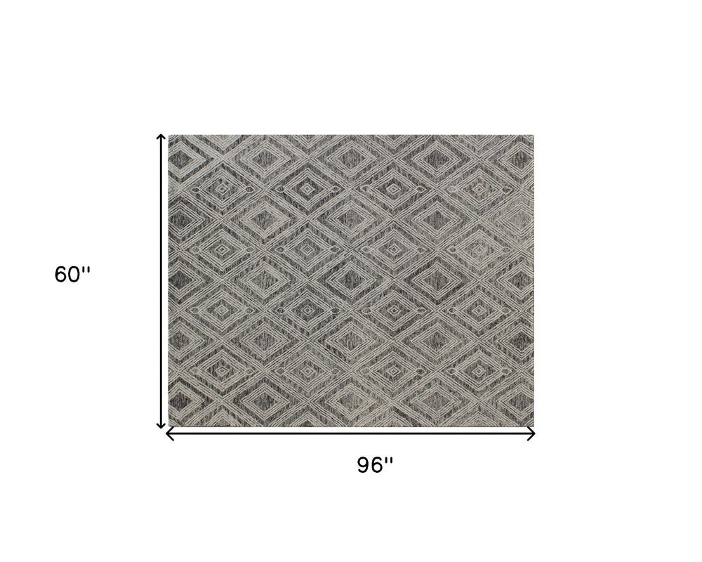 5' X 8' Black and Ivory Wool Abstract Geometric Hand Tufted Non Skid Area Rug