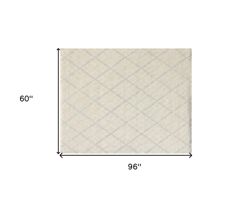 5' X 8' Ivory Wool Abstract Geometric Hand Tufted Non Skid Area Rug