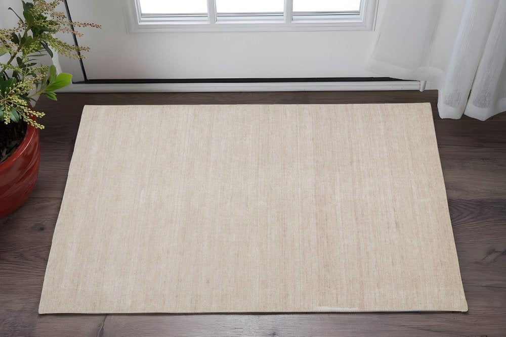 2' X 3' Tan Abstract Hand Woven Area Rug