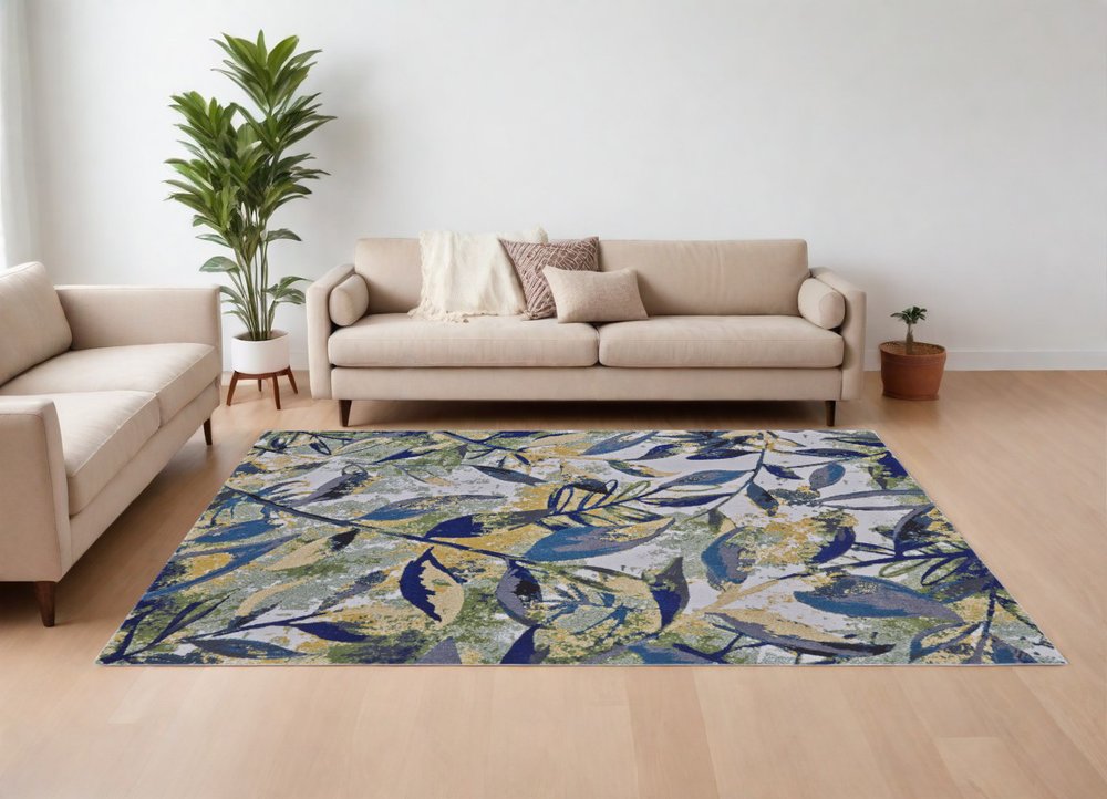 10' X 13' Green Blue and Ivory Floral Power Loom Worn Faded Area Rug