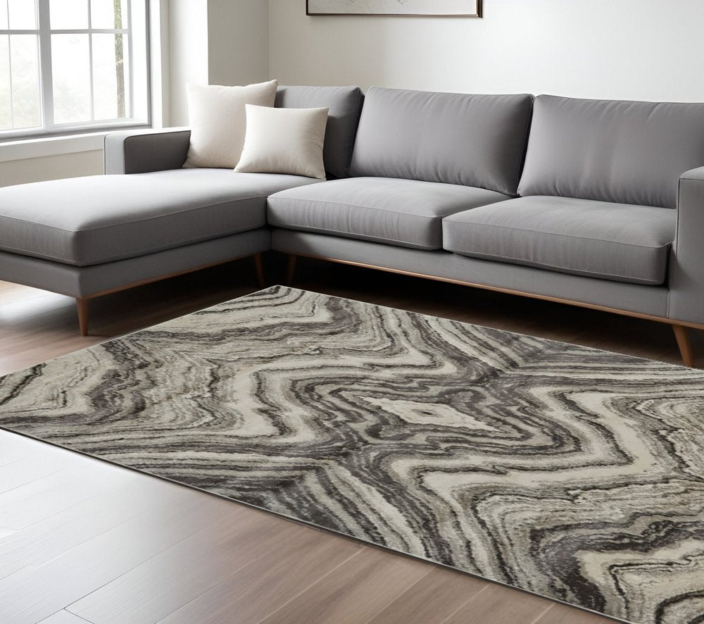 7' X 10' Ivory Gray and Tan Abstract Power Loom Area Rug