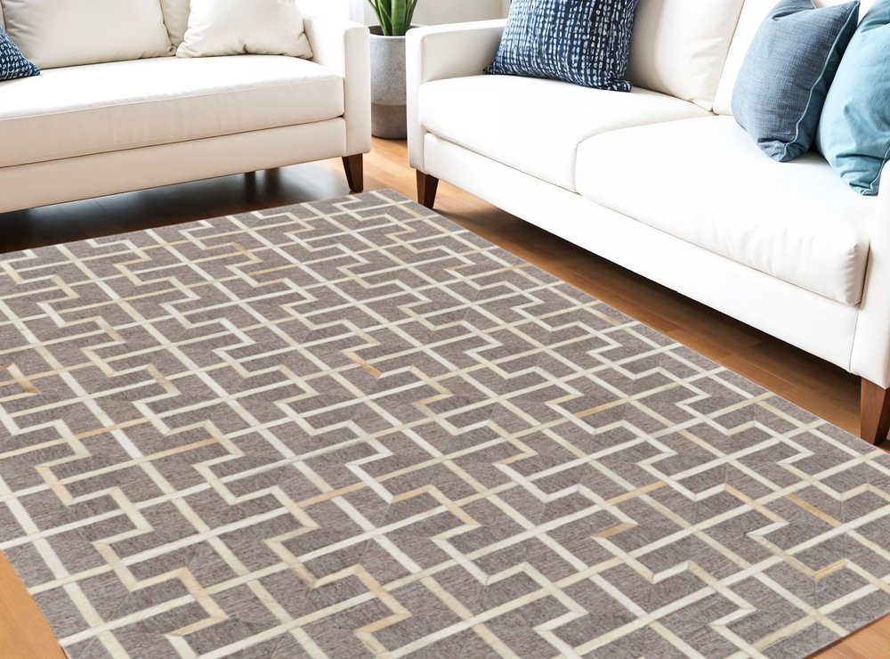 5' X 8' Tan and Ivory Geometric Hand Woven Area Rug