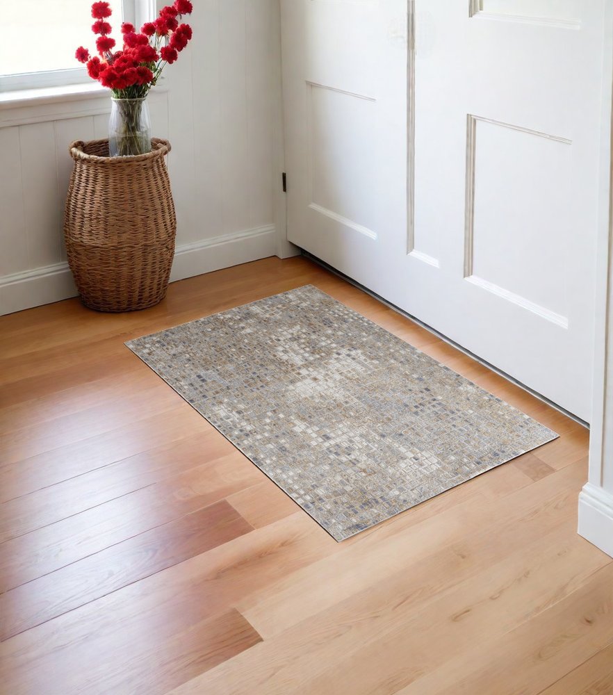 3' X 5' Tan Ivory and Blue Geometric Power Loom Worn Faded Area Rug