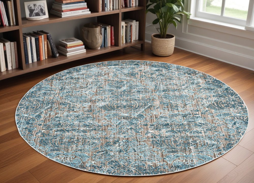 9' Blue Taupe and Ivory Abstract Power Loom Worn Faded Round Rug