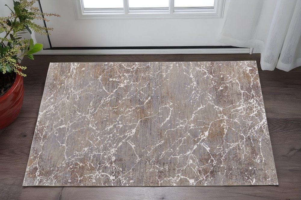 2' X 3' Taupe Brown and Ivory Abstract Power Loom Area Rug