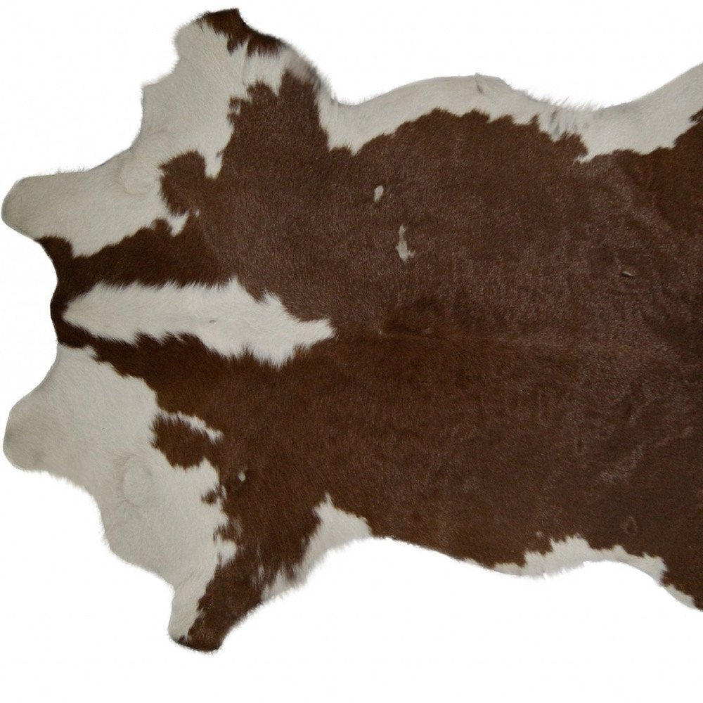 2' X 3' Brown And White Cowhide Cowhide Print Hand Tufted Area Rug