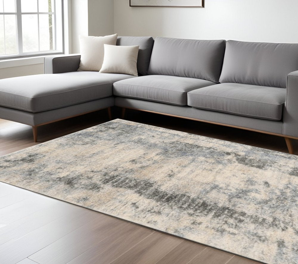 5' X 8' Ivory And Blue Abstract Area Rug