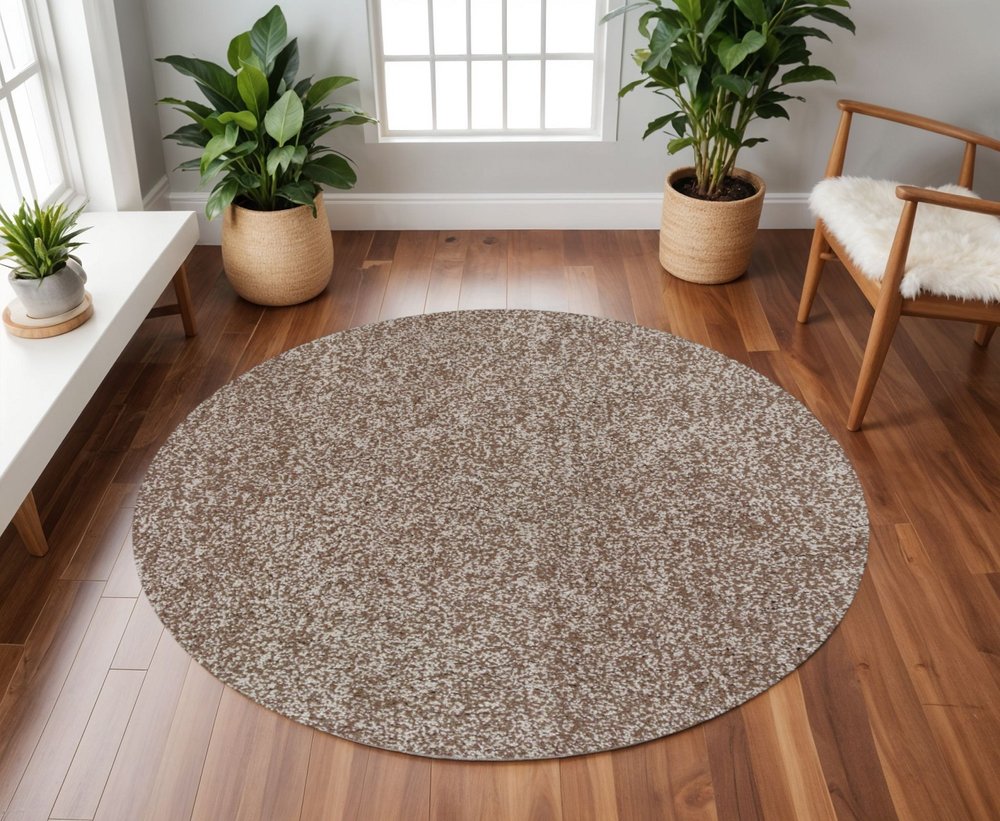 5' X 7' Beige And Brown Abstract Shag Hand Woven Area Rug