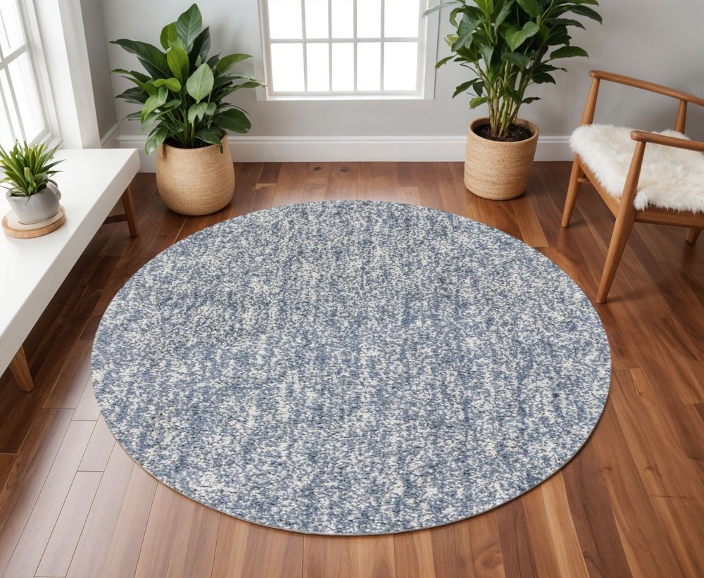 5' X 7' Slate Blue And Ivory Abstract Shag Hand Woven Area Rug