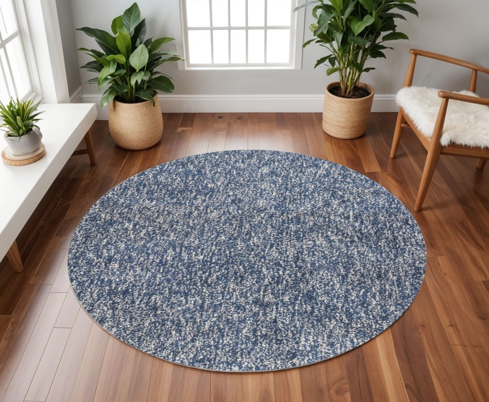 8' X 11' Indigo And Ivory Abstract Shag Hand Woven Area Rug