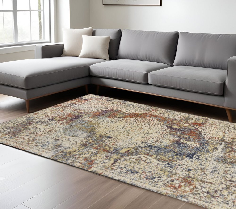 5' X 8' Ivory Blue And Orange Medallion Area Rug