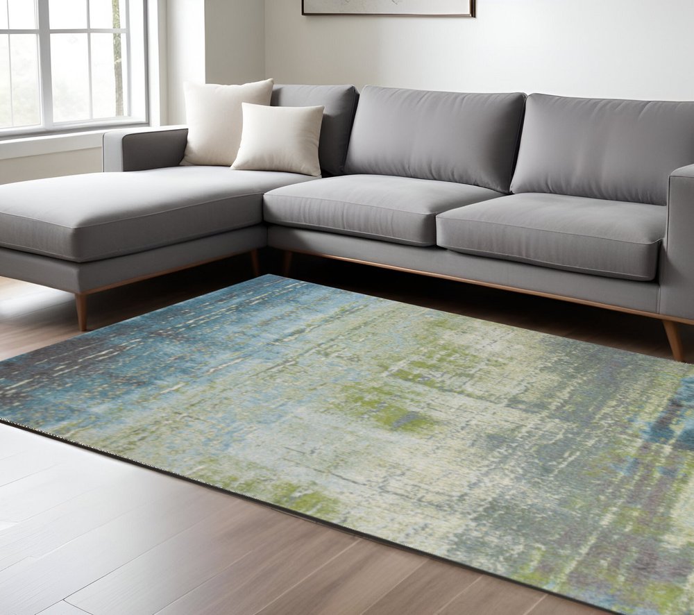 9' X 13' Blue And Green Abstract Area Rug