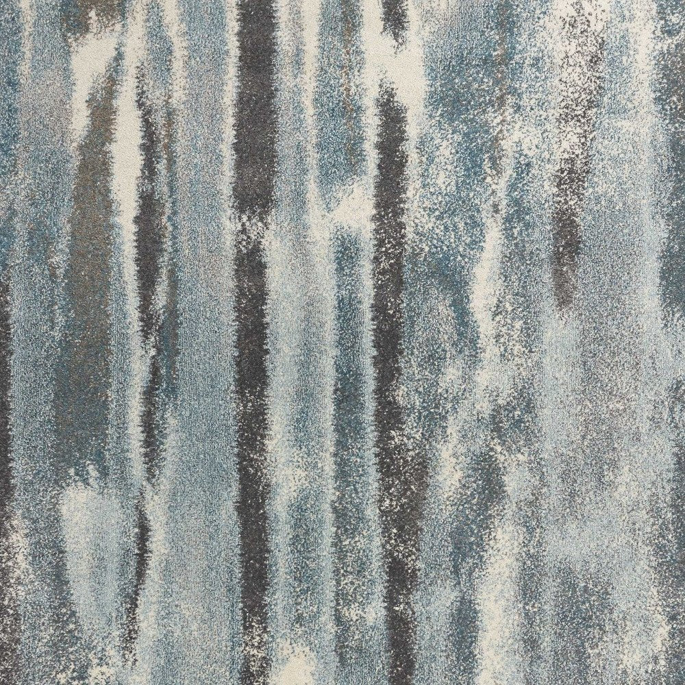 9' X 13' Teal Blue And White Abstract Area Rug