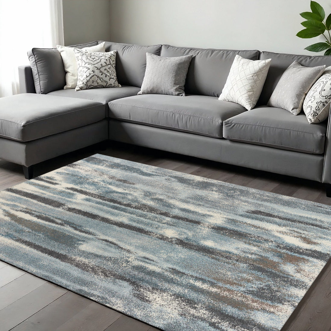 9' X 13' Teal Blue And White Abstract Area Rug