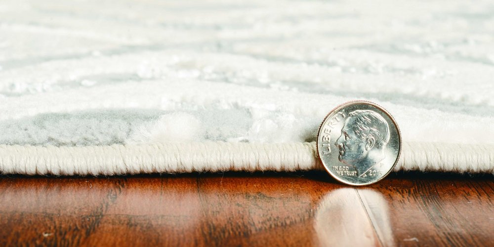 7' X 10' Sand And Light Blue Geometric Area Rug