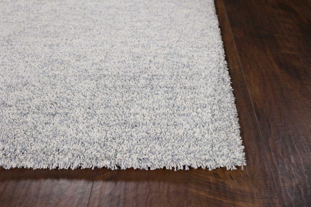 5' X 7' Slate Blue And Ivory Abstract Shag Hand Woven Area Rug