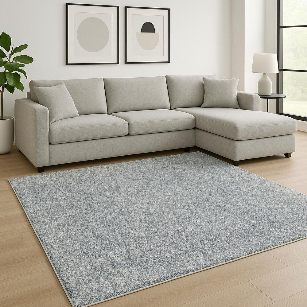 5' X 7' Slate Blue And Ivory Abstract Shag Hand Woven Area Rug