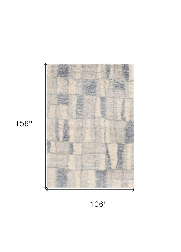 4' X 6' Ivory And Blue Abstract Geometric Distressed Area Rug