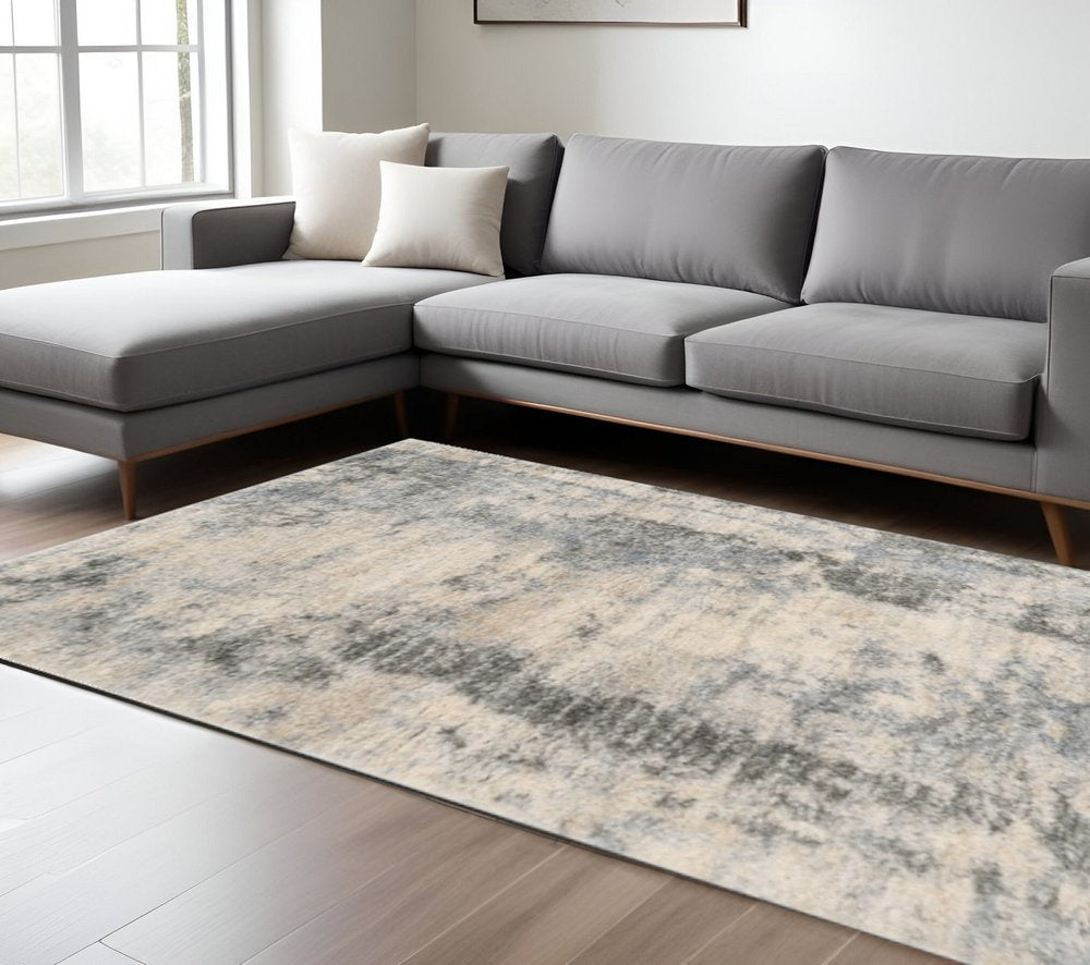 5' X 8' Ivory And Blue Abstract Area Rug