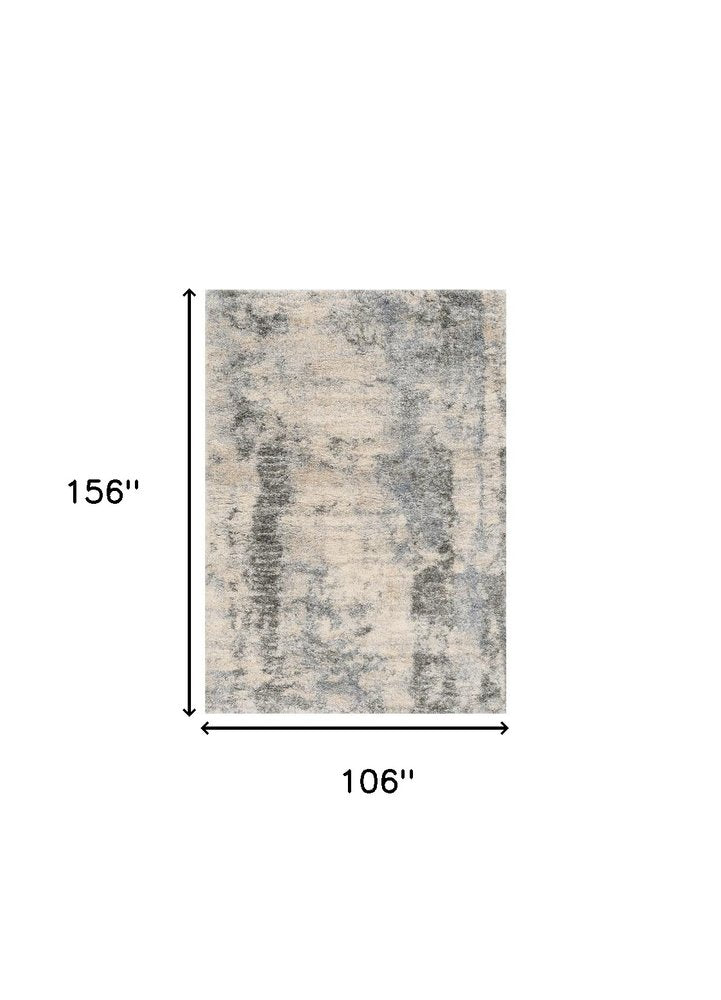 5' X 8' Ivory And Blue Abstract Area Rug