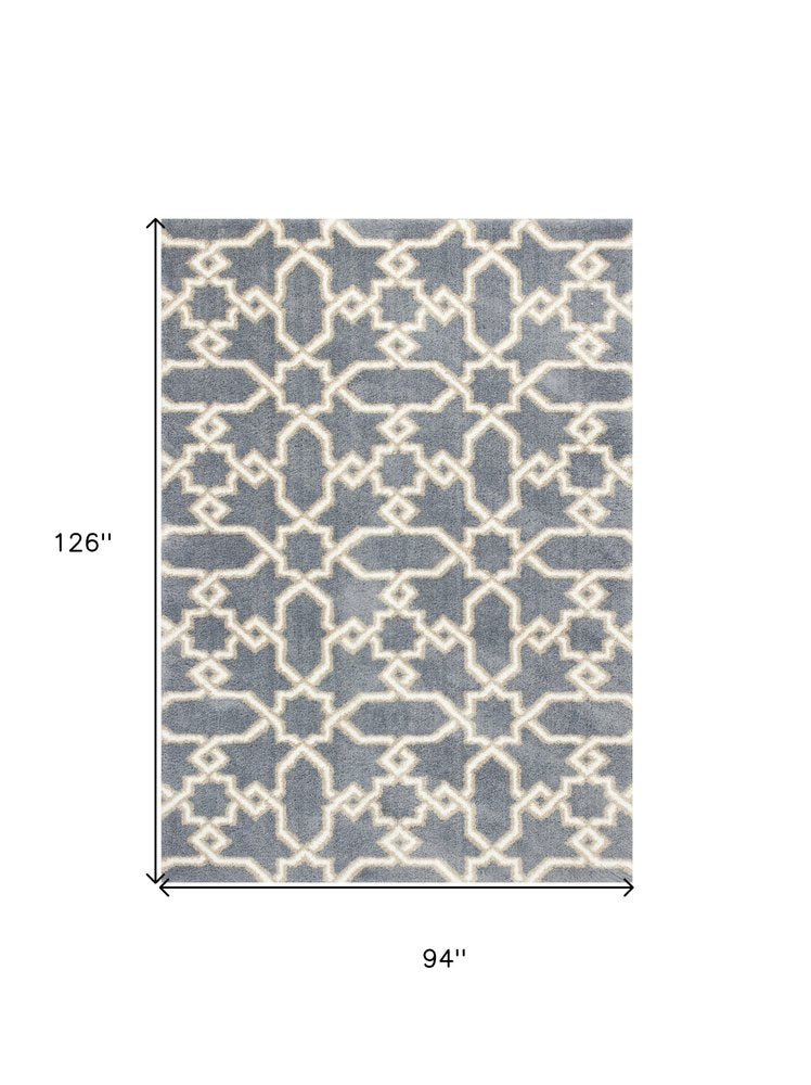 5' X 8' Slate Blue And Ivory Geometric Area Rug