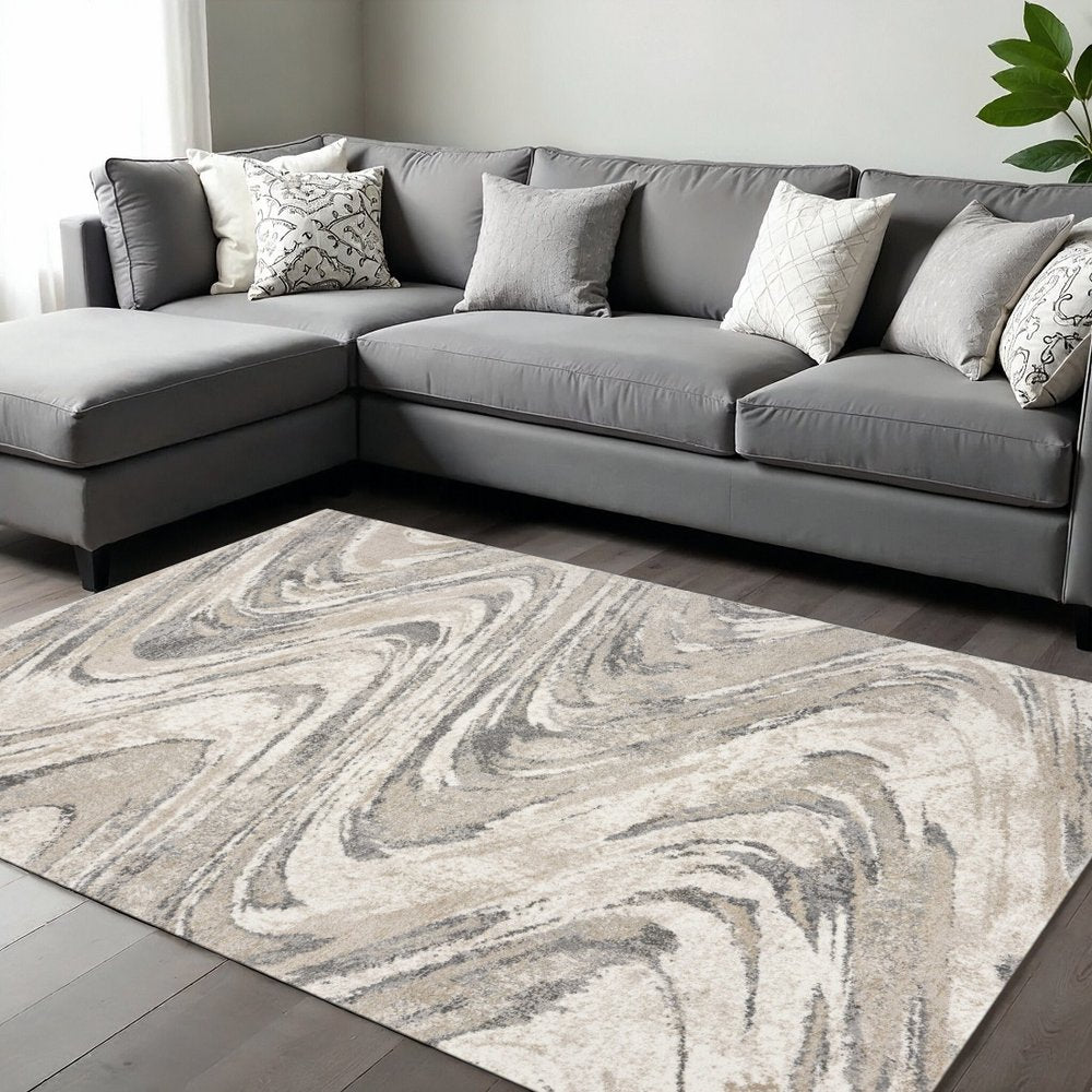 7' X 9' Gray And Tan Abstract Area Rug