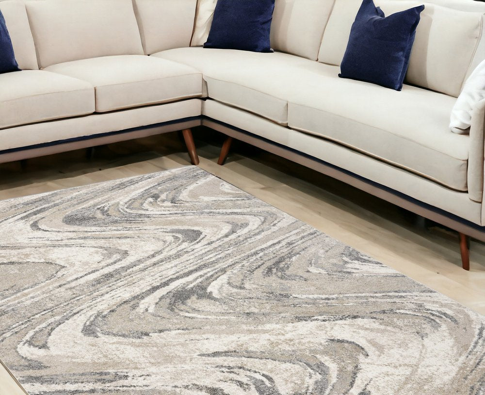 7' X 9' Gray And Tan Abstract Area Rug
