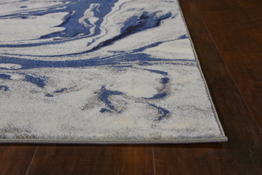 9' X 13' Blue Gray And Ivory Abstract Area Rug